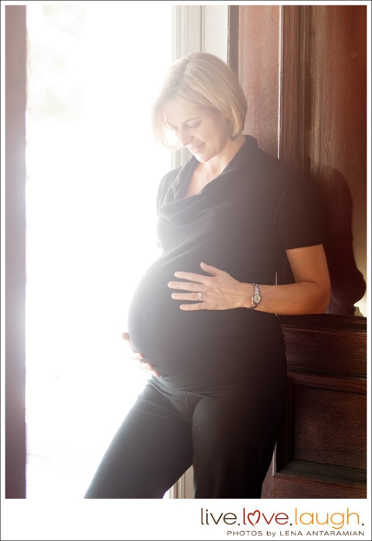 Non traditional maternity photograph - mama-to-be posing in a doorway