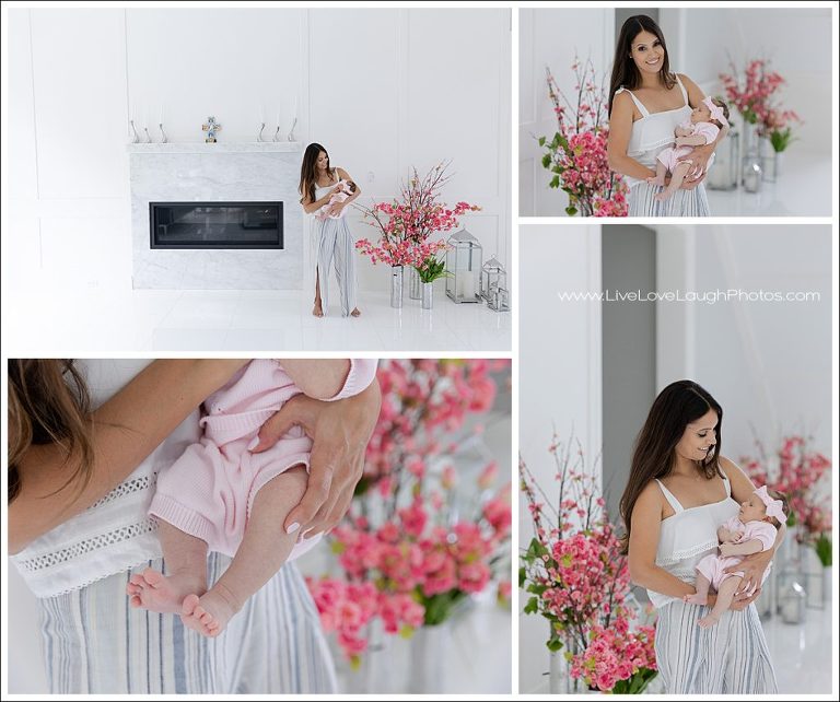 New mama is holding her baby at her at home session in Saddle River